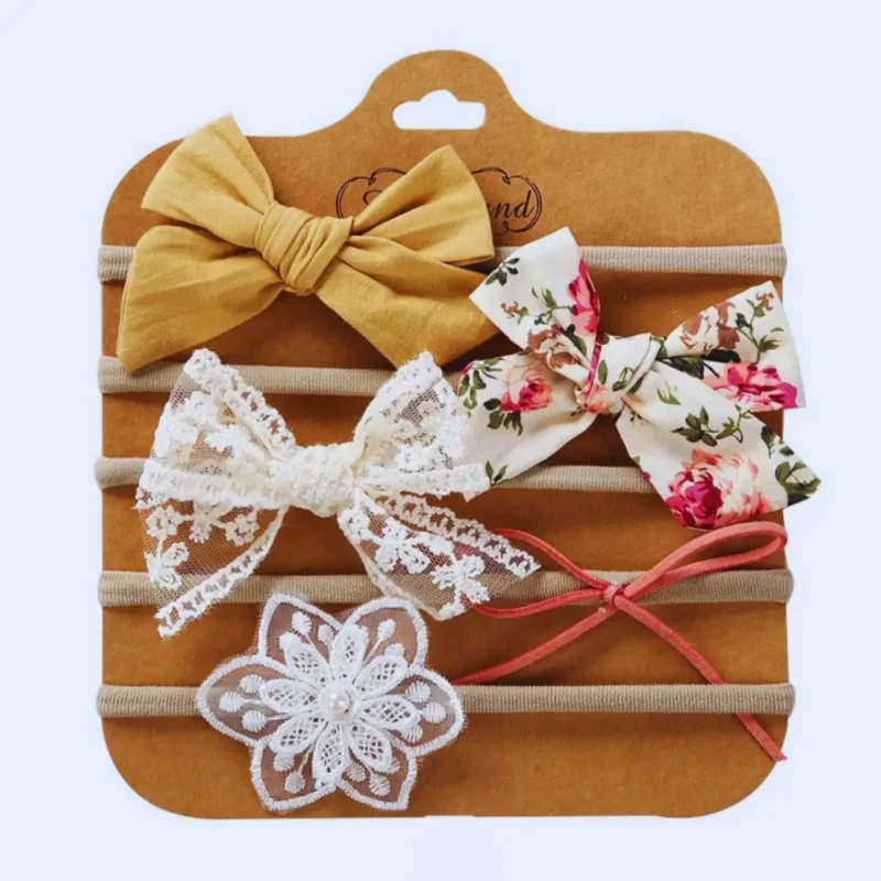 Komplet 5 dekorativnih naglavnih trakov za punčke – oranžna barva.