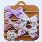 Komplet 5 dekorativnih naglavnih trakov za punčke – vijolična barva.