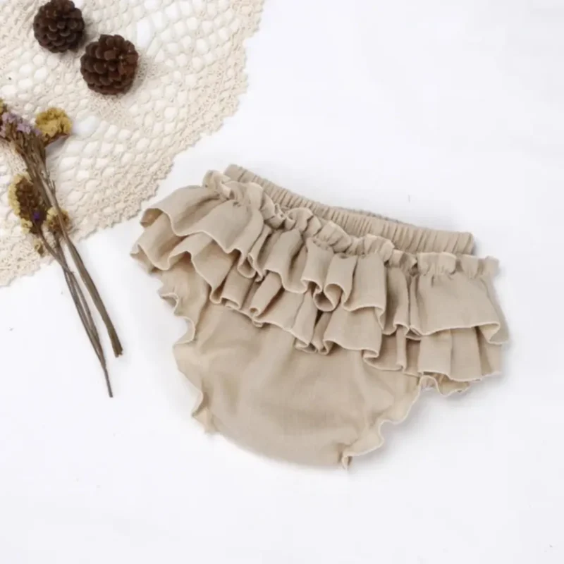 Hlačke ruffle bež-rjava